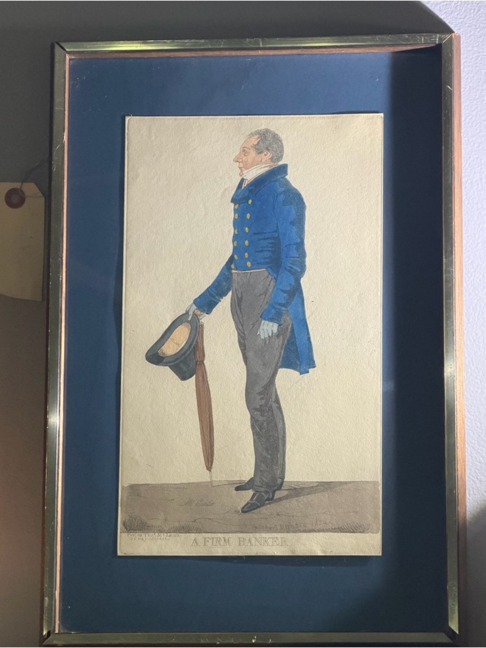 Antique Hand colored etching titled “A Firm Banker”
